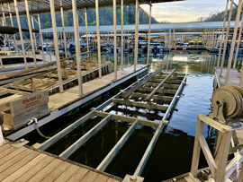 6500lbs Capacity Premier Front-Mount Boat Lift For Sale on Norris Lake Tennessee with Transferable Covered Slip Available at Norris Landing Marina